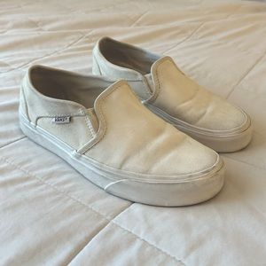white slip on vans
